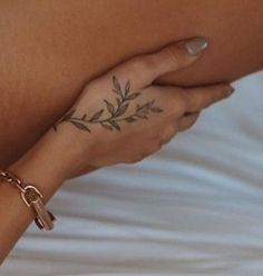 a woman's arm with a tattoo on it