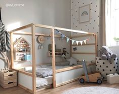 a child's bedroom with a bed and toys