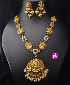 Lakshmi Premium quality Matte gold finish Necklace with Earrings - Traditional Necklace - Temple Jewelry - MK Fashionkart Earrings: Matching Earrings Material: Matte gold finish, AD Stones Suitable for Saree/Salwar/party wear dresses Adjustable length    SHIPPING : Ready to ship in 1 business day. This item will be shipped from The United States. Jewelry care instructions : 1. Please wipe the jewelry with a piece of cotton cloth after usage.  2. Store the jewelry in a cool, dry and air tight box Laxmi Pendant Gold Temple Jewellery, Salwar Party Wear, Temple Jewelry Necklace, Traditional Necklace, Gold Temple Jewellery, Earrings Matching, Temple Jewelry, Gold Chain Design, Thanks For The Gift