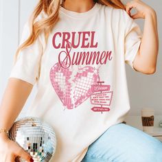 Get ready to rock your heart out with our Cruel Summer Comfort Color Tee! This playful tee is sure to add a fun pop of style to your wardrobe while showing off your love for TayTay. Perfect for any fan! Design is Printed Direct to Garment. See Size Guide for Comfort Color Unisex Tee We recommend comparing these measurements against a shirt that you like the fit of for ordering a tee that will fit best. Crafted Just for You: Our products are made to order, and we're all about delivering that extra touch of personalization. Expect an order confirmation email right after you shop, and then we'll hustle to get your order ready within 7 days. When it's time to ship, we'll send you a delightfully exciting email with tracking to keep you in the loop. Unwrap the Fun: Anticipate the arrival of your Taylor Swift Tshirt, Cruel Summer, Order Confirmation, Fan Design, Graphic Apparel, Summer Break, Comfort Colors Tee, Comfort Color, Summer Design