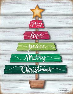 a christmas tree made out of wood with the words i love peace merry christmas written on it