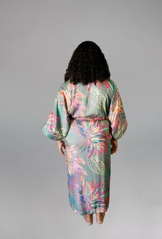 Pack less with this versatile piece - to be worn as a robe, a duster or a Swimsuit coverup! Made from ultra-soft recycled materials Produced by artisans in the USA Roomy Pockets Hidden Affirmations Comes with a 3" x 72" belt Machine washable The name Carmen symbolizes freedom. This bold print showcases a variety of beautiful colors over a deep grey background. Beachwear Wrap Cover-up For Loungewear, Beachwear Cover-up Wrap For Loungewear, Long Sleeve Robe For Beachwear And Loungewear, Beachwear Wrap Cover-up, Beach Season Robe For Loungewear, Beachwear Robe For Beach Season Loungewear, Beachwear Robe For Lounging At The Beach, Multicolor Beachwear Cover-up For Loungewear, V-neck Kimono For Beachwear And Loungewear