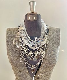 * This is a CUSTOM ORDER, please allow 2-3 weeks for creation!  I will be in contact with you the entire time as you choose what specialized rhinestone pieces you want in your unique statement piece made just for you. * This bib style necklace can be worn at all times of the year and is sure to be a staple in your collection for many years to come. Sometimes you just need a crystal clear necklace to go with anything all year round.  I have a lot of vintage rhinestone pieces in my inventory that Crystal Jewelry With Rhinestones For Crafting, Wedding Necklaces With Rhinestones, Bling Crystal Costume Necklaces, Bling Rhinestone Necklace As A Gift, Dazzling Crystal Embellished Necklaces, Glamorous Jewelry With Bling, Glamorous White Bling Necklace, Bridal Crystal Necklace With Jewels, White Crystal Bling Necklace