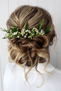 a woman with flowers in her hair