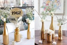 there are three vases with flowers in them on the table and one is gold