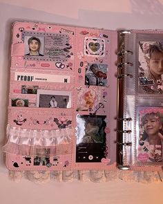 an open pink book with pictures and photos on it