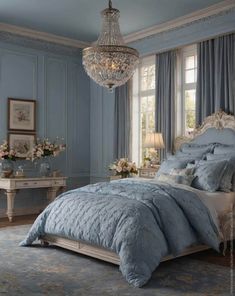 a blue bedroom with chandelier, bed and window in the corner is shown