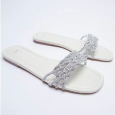 Nwt Zara White Sparkly Low Heeled Sandals In Size Us 7.5. White Flat Sandals. Featuring Wide Front Strap With Sparkly Detail. Squared Toe. Heel Height: 1 Cm / 0.4 Inches Composition: Upper 75% Polyester, 25% Polyurethane Thermoplastic Lining 100% Polyurethane Thermoplastic Sole 100% Polyurethane Thermoplastic White Flat Sandals, Low Heeled Sandals, White Flat, Low Heel Sandals, Zara White, White Flats, Zara Shoes, Heeled Sandals, White Silver