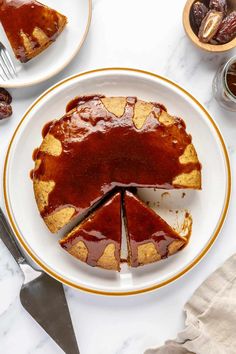 a piece of cake on a plate with the rest of it cut out and ready to be eaten