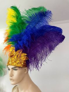 "We make and ship our items really fast if you need it for a specific date please let us know. or call/text us at 954-3051817 to complete your order over the phone Rainbow Pride Prime Ostrich Wing Plumes Feather Carnival Headdress Showgirl on a Custom Tiara/crown We only use the best quality of ostrich wing feathers. Each feathers is approximately 20\" tall. The crown is completely hand beaded in sequined and acrylic beads. Feathers are a natural product therefore a slight variation in texture, High Crown Costume Hats And Headpieces For Mardi Gras, Tall Crown Costume Hats And Headpieces For Carnival, High Crown Headpiece For Carnival Costume Party, High Crown Costume Hat For Mardi Gras, Mardi Gras Costume Hat With High Crown, Adjustable Costume Hats For Mardi Gras Carnival, Adjustable Costume Hats And Headpieces For Mardi Gras, Feathered Costume Hats And Headpieces For Mardi Gras, Feathered Hats And Headpieces For Mardi Gras Costume Party