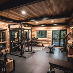 a home gym with lots of exercise equipment