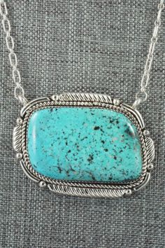 This Kingman turquoise and sterling silver necklace was made by Zuni silversmith Kenny Calavaza. The back of the necklace is signed K. C. and Zuni, NM.Necklace: 14"Length: 2 1/4"Width: 1 5/8"Free shipping on all orders! We ship with USPS and always include tracking. All orders ship within a day of payment.Returns are accepted up to 30 days after you receive your order. Just send us a message. Our shop offers cash back or store credit. The item must be returned in new condition. Collectible Turquoise Sterling Silver Necklace, Kingman Turquoise, Native American Jewelry, Turquoise Sterling Silver, Free Jewelry, Sterling Silver Necklaces, Turquoise Bracelet, Turquoise Necklace, Silver Necklace