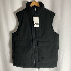 Zara Puffer Black Vest With Front Pockets Size M Black Techwear Puffer Jacket With Pockets, Techwear Vest With Pockets For Fall, Black Vest With Padded Collar, Black Casual Vest With Pockets, Casual Black Vest With Pockets, Black Puffer Jacket With Pockets For Winter, Urban Fall Vest With Pockets, Urban Vest With Pockets For Fall, Urban Black Spring Puffer Jacket