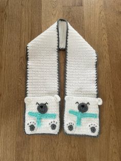 "Crochet polar bear pocket scarf, white with grey edge Pockets are 7\" deep Made from 100% acrylic Machine wash and dry Measures 52\" X 7\"" Crochet Polar Bear, Harry Potter Hat, Chair Socks, Pocket Scarf, Crochet Scarf Pattern, Pocket Scarves, Scarf Crochet Pattern, Crochet Cat, Cat Paws