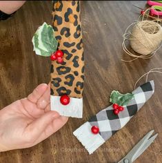 someone is making christmas decorations out of fabric