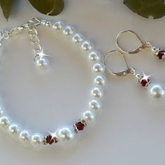 Pearls set is made with white glass pearls and high end European crystals and rhinestone spacers. Perfect for weddings -Handmade item -Materials: High end European crystals -Closure: Lobster clasp -Made to Order White Crystal Pearl Bracelet Gift, White Crystal Jewelry Sets As Gift, White Crystal Jewelry Sets For Gift, Elegant White Jewelry For Birthday, White Crystal Jewelry With Spacer Beads, Wedding Pearl Jewelry With Spacer Beads, Elegant Crystal Jewelry For Birthday, Elegant Beaded Jewelry For Birthday, Elegant Beaded Jewelry For Birthdays