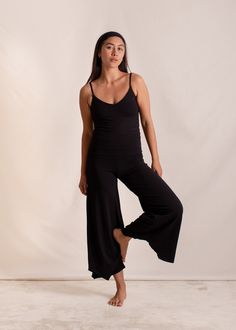 Inspired by the moving and evolving body, giving you comfort and effortless style no matter the stage of your female form. We bring to you, our cherished Layla Flares, made sustainably with love and the intention for all bodies to simply be. Perfect for Yin, Meditation, flowy movement and your everyday comfort. Moulds to the unique contours of your body, feeling like a soft second skin. Soft & stretchy plant viscose is a favourite for new and expecting mums. Gradually Flared for a flowing silhou Black Cotton Yoga Bottoms, Indigo Luna, Black Yoga Legwear, Stretch Full-length Yoga Flares, Black V-neck Activewear For Yoga, Yoga Flare Pants, Organic Cotton Leggings, One Piece Clothing, Slow Fashion Brands