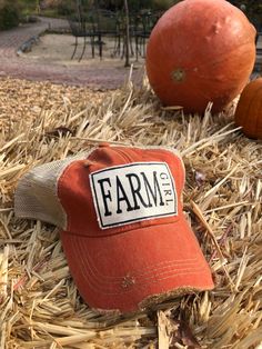 Details Vintage Distressed Trucker Cap "Farm Girl"Color: Orange Distressed Material: Cotton/Polyester blend, Mesh backSize: One size fits most, with an adjustable snapback strap. Unisex cap. Country Style Baseball Cap For Spring, Casual Snapback Hat For Country Events, Country Style Baseball Cap, Country Style Snapback Hat, Country Style Adjustable Snapback Baseball Cap, Adjustable Country Style Snapback Baseball Cap, Country Style Trucker Hat For Spring, Country Style Snapback Cap, Trendy Fall Snapback Baseball Cap