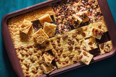 a casserole dish with crackers and nuts on top