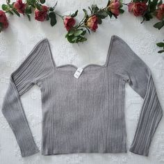 Gorgeous, Silver Metallic Banana Republic Sweater/Top. Nwt And Size Xl It Has A Lovely Shimmer With A Sweetheart Neckline. It Is A Fitted Top Of Hip Length. Material Is 81% Viscose Rayon, 12% Metallic & 7% Nylon. Please See Measurements That Were Taken With Garment Laying Flat. Also Included Is The Br Sizing Chart. #Christmas #Holiday #New Years #Date Night Metallic Sweater, Viscose Rayon, Banana Republic Sweater, Fitted Top, Sizing Chart, Hip Length, Sweetheart Neckline, Sweater Top, Banana Republic