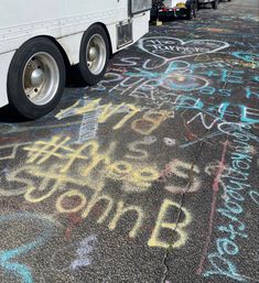 the back end of a bus with writing on it