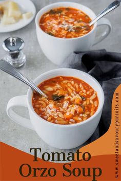 two bowls of tomato orzo soup on a table