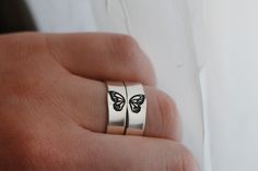 Butterflies represent change, and the courage to embrace a transformation that makes life better. Beautifully crafted butterfly rings make the perfect symbol of friendship. Show your bestie how much they mean to you with this stunning matching jewelry set. Make your connection unique with these butterfly best friend rings. Stunningly crafted from high-quality materials, this Butterfly Ring Set is the perfect way to show your best friend how much you care. Featuring two intricately detailed butte Dainty Butterfly Ring For Anniversary, Minimalist Adjustable Butterfly Ring As Gift, Adjustable Minimalist Butterfly Ring As Gift, Cheap Butterfly Ring For Gift, Adjustable Butterfly Jewelry For Wedding, Minimalist Butterfly Ring As A Gift, Adjustable Butterfly Promise Ring, Minimalist Butterfly Ring As Gift, Handmade Sterling Silver Butterfly Promise Ring