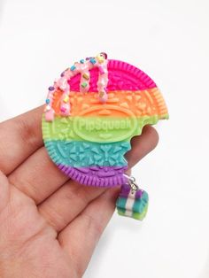 If a rainbow cookie necklace isn't already cool enough, it also glows in the dark! This cookie necklace is handmade entirely out of polymer clay. Decorated with dripping sauce, adorable sprinkles, and a metallic pink chain.The pink chain is 25cm long, and the cookie is 4.5cm wide, and 4.5 cm long. The hanging cookie piece is 2cm long.If you would like to see my other necklaces feel free to take a look at them here:https://www.etsy.com/shop/PunkInPink?section_id=15394373&ref=shopsection_leftn Fun Polymer Clay Jewelry For Birthdays, Rainbow Novelty Jewelry For Birthday, Rainbow Kawaii Jewelry For Gift, Rainbow Polymer Clay Jewelry For Gifts, Cookie Necklace, Rainbow Stuff, Rainbow Cookie, Pink Chain, Best Friend Necklace