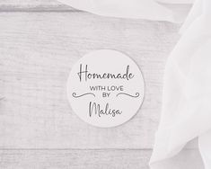 a sticker that says homemade with love by mahlja on the back of a white shirt