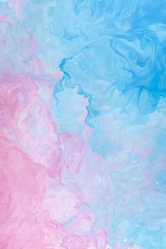 an abstract painting with blue and pink colors