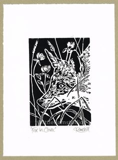 a black and white drawing of a fox in the grass