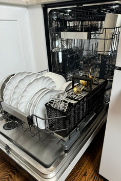 the dishwasher is full of clean dishes