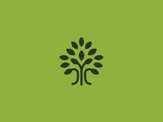 a tree with green leaves on it is shown in the middle of this logo design