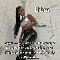 a woman standing in front of a marble wall with a quote on it that says, libra do you ever just get a vibe that someone has crush on and you and you're not sure