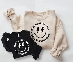 Cool Cousins Club Sweatshirt. Matching Family Sweatshirts. Toddler, Youth and Adult Sizes available. Gender Neutral Colors available for boys and girls of all ages.  *Items sold individually so you can order an assortment of sizes for your unique family* (For both sweatshirts, add 2 items to your cart). ♡ HOW TO ORDER: 1. Select Size and Sweatshirt Color using the drop down menu. 2. Click Add to Cart. Repeat for each sweatshirt. 3. Once all items are added, click the cart to checkout completed o Cousin Gift Ideas, Cousin Crew Shirts, Cousin Shirts, Gender Neutral Colors, Cousin Gifts, Cousin Crew, Sweatshirt Details, Club Sweatshirts, Sorority Shirts