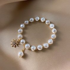 Description: Look great, feel wonderful and sophisticated, wearing this women's fashion elegant stylish luxury statement flower design premium quality simulated pearl bracelete jewelry. You will have lots of ways to enjoy this gorgeous, versatile and beautiful bracelet jewelry with your variety of outfits. Awesome to wear for special events like weddings, engagement parties, birthday celebrations, banquet dinners, dates and more, and also an excellent choice as a gift to you or to your loved one Pearl Bracelet Jewelry, White Pearl Bracelet, Luxury Girl, Pattern Animal, Pave Setting, Mood Tracker, Pearl Chain, Bracelet For Women, Love Bracelets