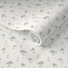 a white wallpaper with palm trees on it