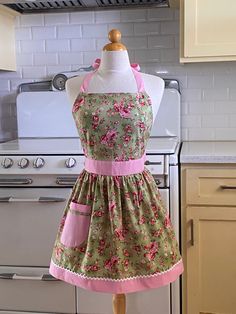 a dress on a mannequin in a kitchen