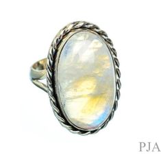 Moonstone Silver Ring, Natural Stone, Moonstone Jewelry, Handmade Ring, Artisan Ring, Boho Ring, Dainty Ring, Christmas Gift, Split Band Metal :- 925 Sterling Silver (Stamp on the Product) **Gemstone Size depends on the Ring Size.** **The Product you will receive may vary from the image as no two gemstone are similar and images cannot define exact product definitions.** Shipping Policy:- I mainly use DHLE, PPS, FedEx for the shipping of goods depending on the amount and days that you have ordere Handmade Mystical Round Moonstone Ring, Mystical Round Handmade Moonstone Ring, Mystical Handmade Round Moonstone Ring, Mystical Handmade Moonstone Ring, Handmade Mystical Moonstone Ring For Anniversary, Handmade Celestial Opal Ring, Mystical Cabochon Moonstone Ring Gift, Handcrafted Oval Moonstone Ring, Artisan Oval Moonstone Ring Gift