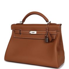 This Hermes Kelly 42 Maxi, in the Retourne style, is of Gold togo leather with palladium hardware and features contrast stitching, front flap with two straps, front toggle closure, clochette with lock and two keys, a single rolled handle and a detachable canvas Gold shoulder strap.The interior is lined in Gold chevre leather and has one zip pocket with Hermes engraved pull and one open pocket on rear wall. There's also one zip pocket on the back exterior of the bag with an Hermes engraved pull.C Timeless Calf Leather Bag With Hasp Closure, Leather Work Bags With Lock, Leather Bags With Lock For Work, Classic Togo Leather Bag With Silver-tone Hardware, Epsom Leather Bags With Turn-lock For Work, Epsom Leather Work Bags With Turn-lock Closure, Classic Bags With Togo Leather And Leather Lining, Classic Togo Leather Bag With Leather Lining, Calf Leather Bag With Hasp Closure For Everyday Use