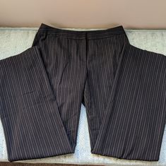 Semantiks Pinstripe Dress Pants In Used Condition, Some Pilling Around Waistband Area. Pants Feature Two Pockets In The Front And Two Unopened Faux Pockets In The Back For Decoration. Pants Are A Combination Of Polyester Rayon And Spandex. New To Poshmark? Use My Referral Code Kallie_chic When You Sign Up And You'll Get A $10 Discount On Your First Purchase Over $10 From Poshmark! :) Black Vertical Stripe Pants For Business Casual, Black Pants With Vertical Stripes For Business Casual, Black Business Casual Pants With Vertical Stripes, Fitted Wide Leg Pants With Vertical Stripes, Business Casual Black Pants With Vertical Stripes, Fitted Black Pants With Vertical Stripes, Tailored Black Bottoms With Vertical Stripes, Elegant Striped Office Pants, Elegant Striped Pants For Office