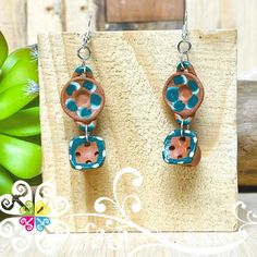 Beautiful handcrafted item that pair wonderfully with any outfit. Each piece is made with love from Mexican Artisans. Made with Mexican Clay and details are added with acrylic paint. Pair with a casual outfit to give it a bit of your Mexican heritage! Long: 1.5 in NOTE: BE AWARE THAT COLORS MAY VARY FROM PICTURES AS THIS ITEM IS HANDMADE Whimsical Green Hand Painted Earrings, Hand Painted Adjustable Brown Earrings, Adjustable Hand Painted Brown Earrings, Artisan Adjustable Polymer Clay Earrings, Adjustable Artisan Polymer Clay Earrings, Whimsical Handmade Turquoise Earrings, Bohemian Hand-painted Resin Earrings, Bohemian Hand Painted Resin Earrings, Unique Hand Painted Flower Drop Earrings