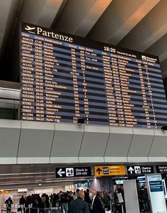 people are standing in line at the airport