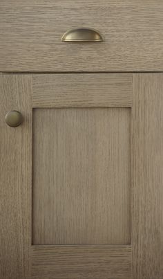 a close up of a wooden cabinet door