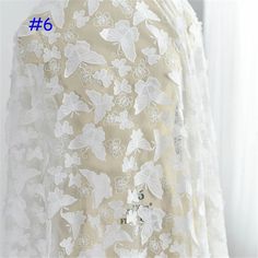 embroidery lace fabricWidth - 51 inches (130 cm)You can choose 0.5 yard or 1 yard. If you buy more, you will get an uncut piece.We offer special discounts for designers and wholesale orders!You can choose a express shipping here:https://www.etsy.com/listing/602095820/express-shipping-charge?ref=shop_home_active_8Please send us your phone number if you choose express delivery.Any problem, please feel free to contact us. This stunning Flower Embroidered Lace Fabric design piece has soft hand feel, White Embroidered Dress For Ceremony, Spring White Wedding Dress, Embroidered White Wedding Dress, Spring Wedding Gown With Lace Work, White Floral Embroidered Dress For Baptism, White Gown For First Communion In Spring, White Embroidered Tulle Fabric For Ceremonies, Summer Wedding 3d Embroidered Fabric, White First Communion Gown For Spring