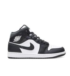 This iteration of the Air Jordan 1 Mid sneakers arrives in a timeless black and white colourway. Crafted from leather, the iconic pair boast two famous logos - the Swoosh and Air Jordan Wings. Designed with padded inner uppers and an encapsulated air unit in each heel, they offer maximum comfort. Custom High-top Sneakers With Embossed Logo For Streetwear, High-top Custom Sneakers With Embossed Logo For Streetwear, Leather Jordan Shoes With Perforations For Streetwear, Sporty Sneakers With Embossed Logo For Streetwear, Sporty Streetwear Sneakers With Embossed Logo, High-top Jordan Shoes With Perforations And White Sole, Urban Sneakers With Embossed Logo For Streetwear, High-top Sneakers With Embossed Logo For Streetwear, High-top Jordan Shoes With Perforated Toe Box For Streetwear