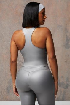 Anywhere Shine Built-In Bra Tank Fabletics Gunmetal Grey Shine female Activewear >> Womens >> Tops >> Tanks regular Training Metallic Stretch Activewear For Sports, Metallic Fitted Athleisure Activewear, Metallic Fitted Workout Activewear, Metallic Fitted Activewear For Sports, Sporty Metallic Activewear For Sports, Metallic Fitted Gym Activewear, Silver Stretch Activewear For Athleisure, Silver Stretch Athleisure Activewear, Fitted Silver Activewear For Sports