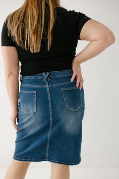 Every modest denim collection needs a classic no-fuss dark wash denim skirt! The 'Scout' denim skirt features a simple design, a modest knee-length, and working pockets for life on the go! The knit denim with belt loops ensures a flattering fit for a variety of body types. Style with a graphic tee and sneakers for an effortless vibe. Perfect for your everyday activities or traveling the world! Exclusively designed by us, for you! 85% Cotton 10% Polyester 5% Spandex Wash Cold Gentle Cycle Hang to Everyday Dark Wash Bottoms With Pockets, Casual Dark Wash Denim Skirt For Everyday, Spring Denim Bottoms For Everyday Use, Denim Bottoms For Everyday Spring Use, Dark Wash Denim Pencil Skirt With Pockets, Everyday Dark Wash Denim Skirt, Fitted Dark Wash Denim Skirt For Everyday, High Rise Dark Wash Denim Skirt For Everyday, Everyday Medium Wash Denim Skirt