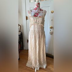 Jaw Dropping Gorgeous Dress In Cloud Soft, 100% Silk. Pale Cream Ground With Sweet Little Floral Design. Ruffle Edges On Straps, Top Of Bodice And At Hem. Softly Pleated Across Bust. Hidden Side Zip. No Stretch At All So Please Note Measurements Carefully. I’m A Dress Size 14/16 With 38/40c Bust And I Can Not Zip This Up In The Bodice Area. Taken Flat And Zipped: Pit To Pit 19”; Waist Where It Joins Bodice Is 17”; Side Base Of Pit To Hem Is 44”; And The Strap Is 9”. ** Price Is Firm** Please See Floral Print Empire Waist Maxi Dress For Daywear, Floral Print Maxi Dress With Empire Waist For Daywear, Rayon Midi Length Sundress For Daywear, Flowy Rayon Sundress For Daywear, Rayon Midi Sundress For Daywear, Flowy Maxi Sundress For Daywear, Cream Flowy Dress For Daywear, Feminine Rayon Dress For Daywear, Lined Maxi Dress For Daywear