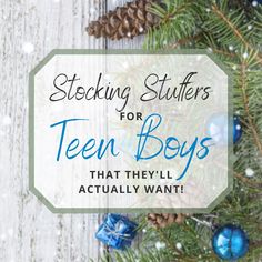 a pine tree with blue ornaments on it and the words stocking stuff for teen boys that they'll actually want